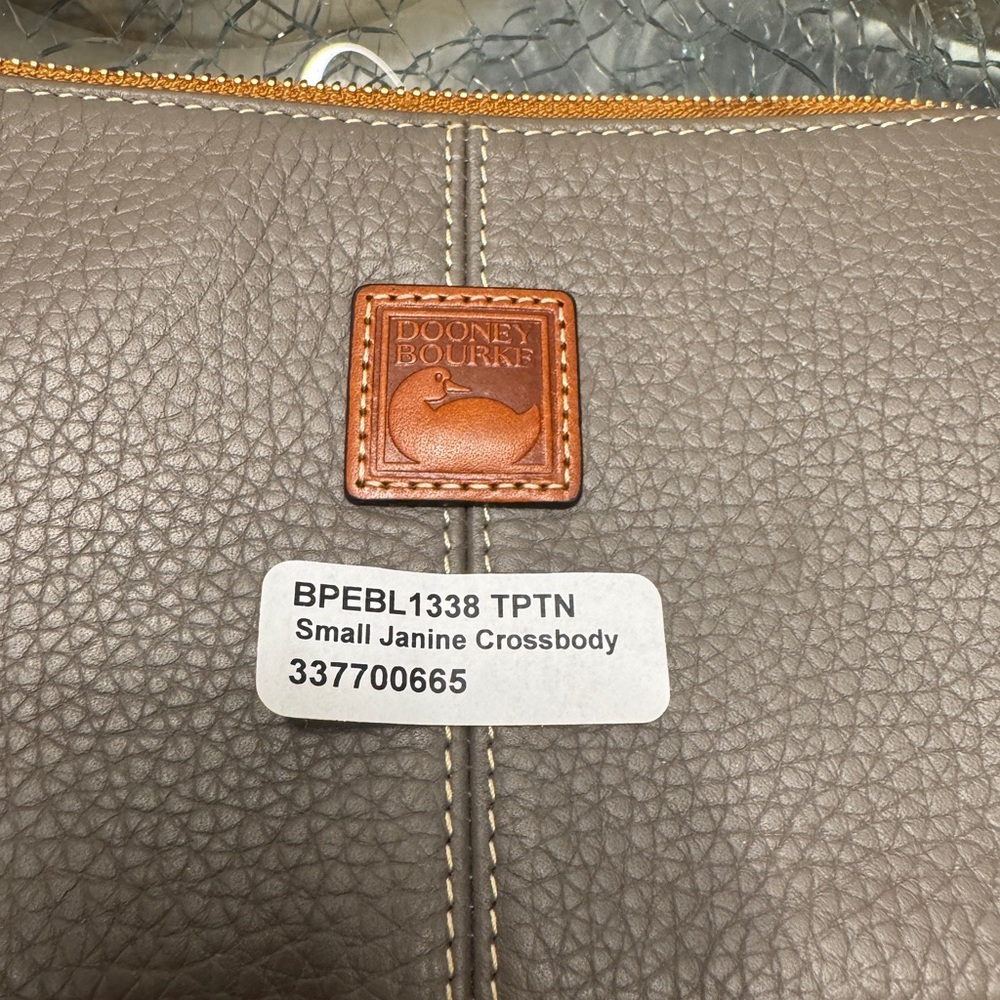 New. Dooney & Bourke small Janine leather Gray Messenger / Crossbody Bag